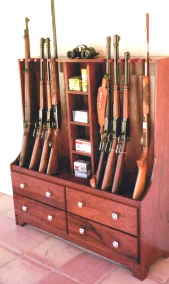 " Custom 10-Gun Native Texas Mesquite finished with Dark Mahogany stain plus tung oil - lots of storage.  Made for a South Texas Ranch Home"